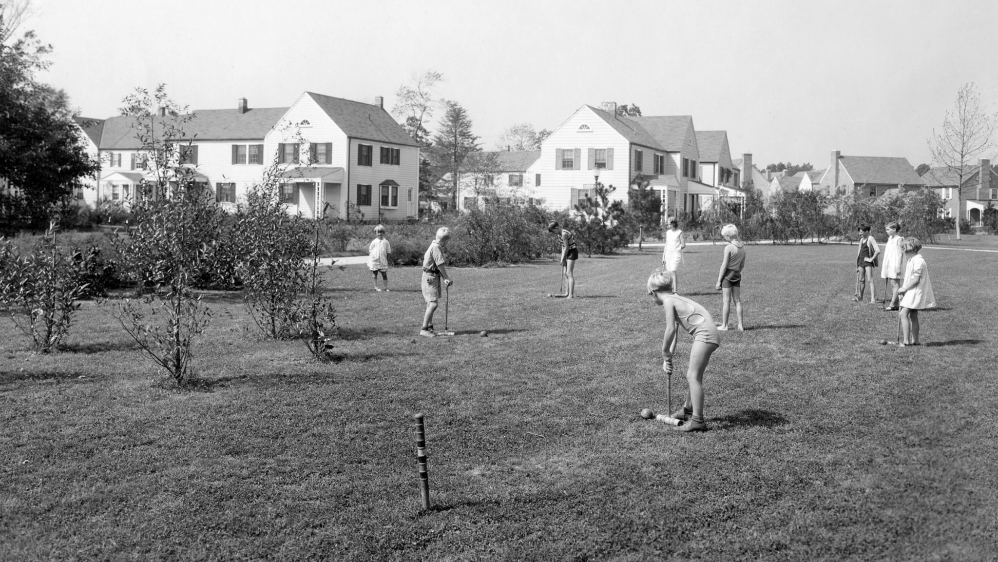 Children playing in an extremely walkable suburban neighborhood.